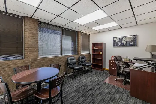 Bright meeting room with chairs and a round table at Valley Hope of Wichita, a detox center in Kansas.