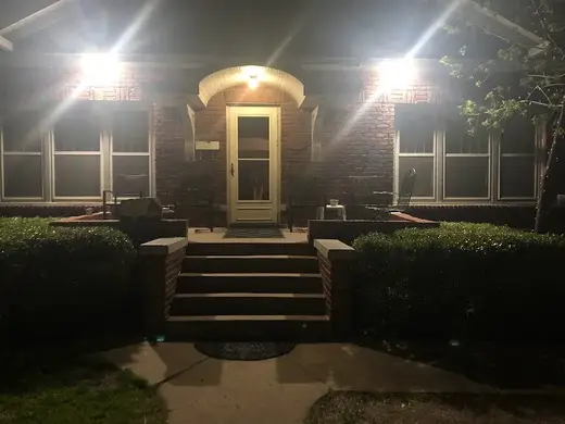 Well-lit entrance of Oxford House North Ash, a sober living home in Kansas.