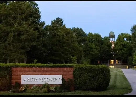 Welcoming entrance sign at Arista Recovery, a sober living home in Kansas.